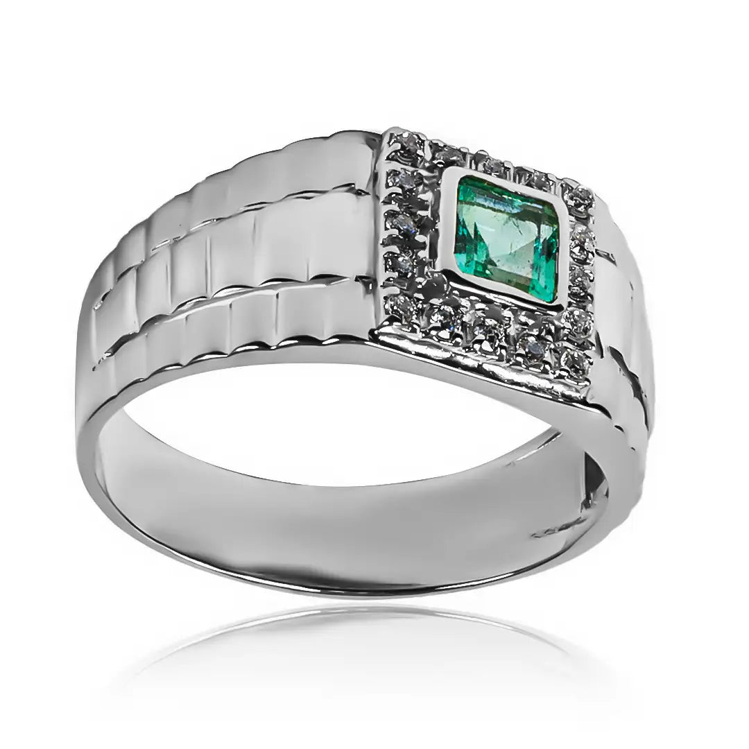 Anillo armis bicolor de oro 18k bicolor, adornado con una esmeralda de Joyería Caracas. Inspirado en la belleza de las piedras preciosas, garantizado de por vida.