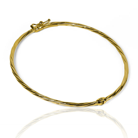 Pulsera aro Melcocha SI elaborada en oro 18K por Joyería Caracas, cuenta con su garantía de por vida.