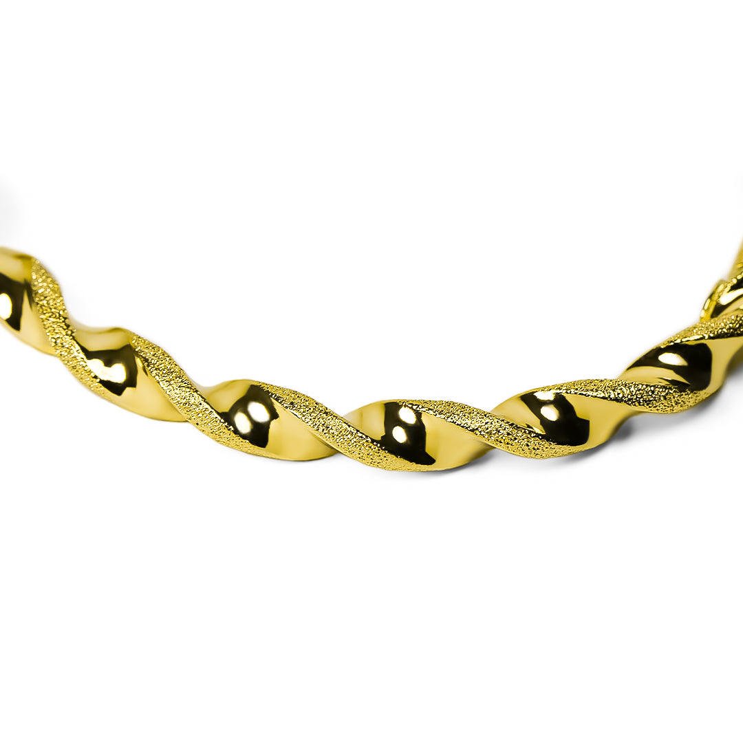 Pulsera Brazalete Melcocha Arena elaborada en oro 18K por Joyería Caracas, cuenta con su garantía de por vida.
