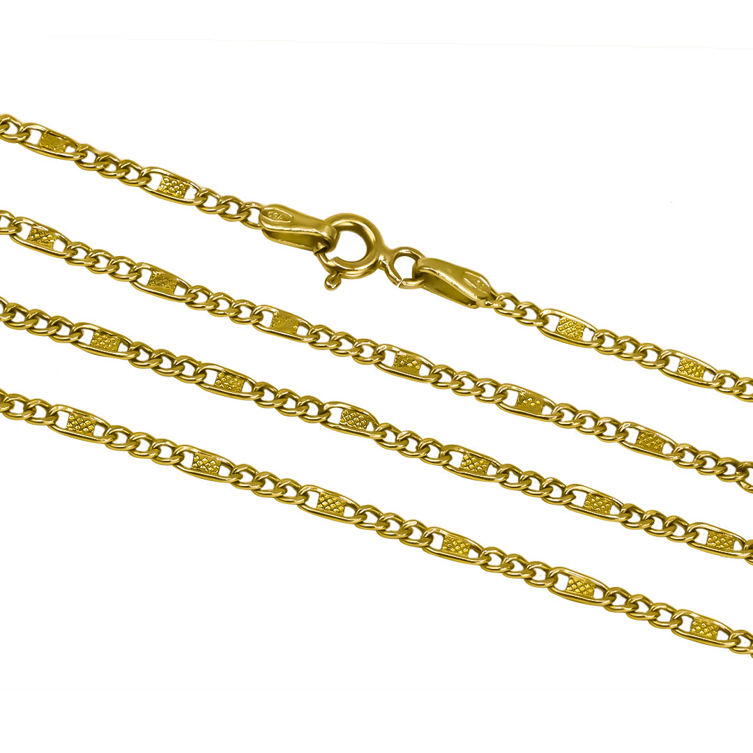 Cadena Cubana 3x1 diamantada de la Joyería Caracas. Hecha de oro de 18, cuenta con garantía de por vida. 