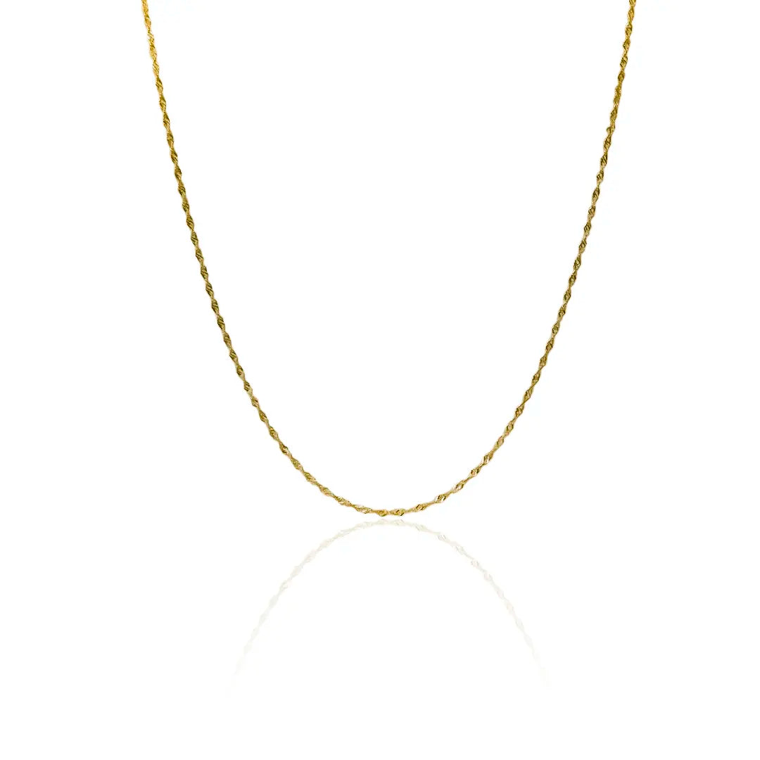 Cadena Singapur SS45, diseñada por Joyería Caracas. Hecha de oro 18k, esta cadena es una pieza de lujo que garantiza calidad de por vida.