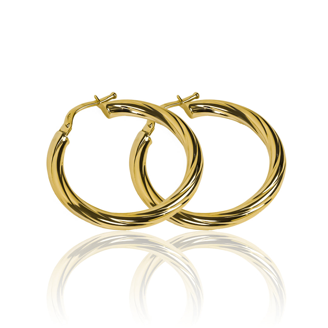 Candongas melcocha classic MI fabricadas en oro 18k por Joyería Caracas, cuenta con una garantía para toda la vida.