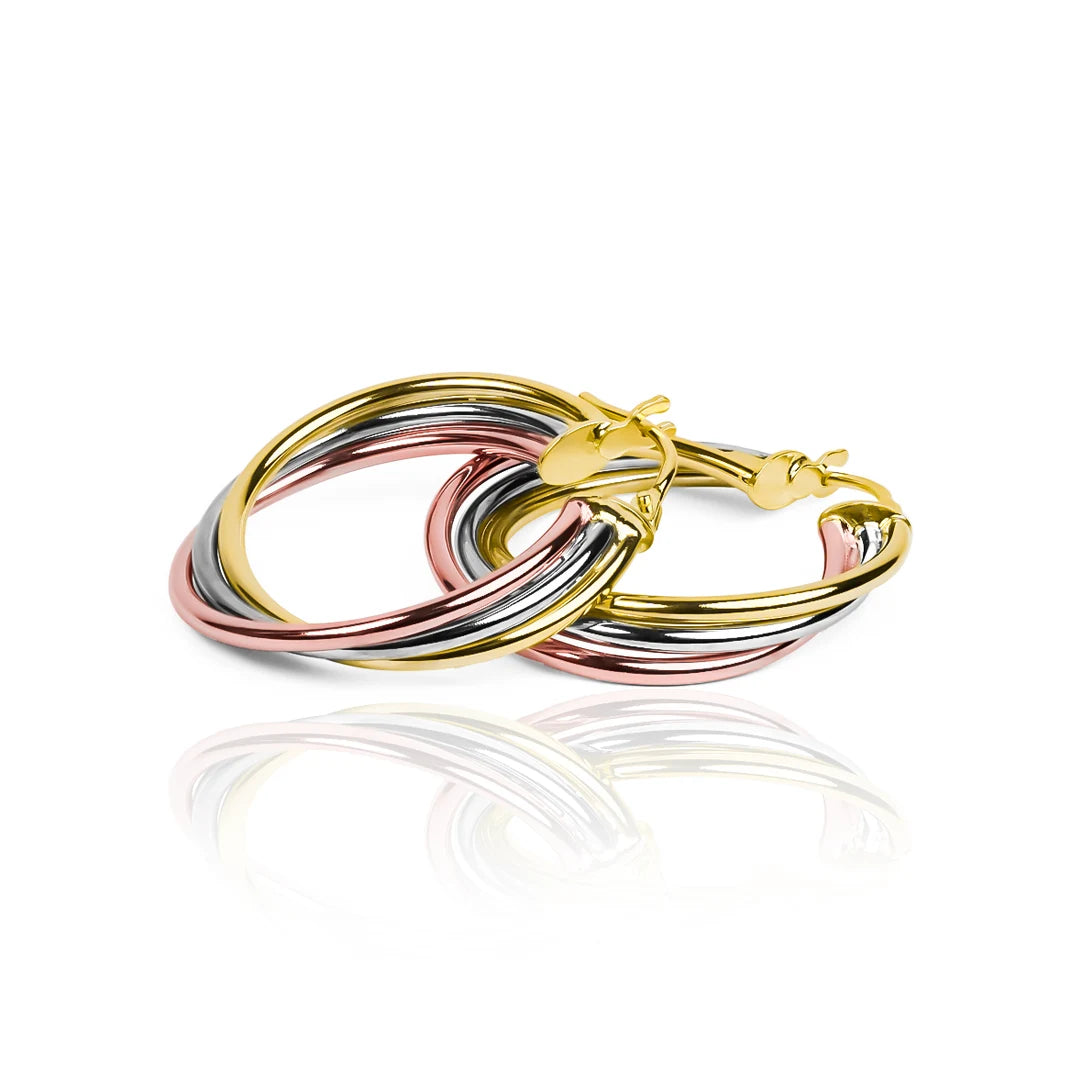 Candongas aros espiral, elaboradas en oro 18K por Joyería Caracas. Con su garantía para toda la vida.