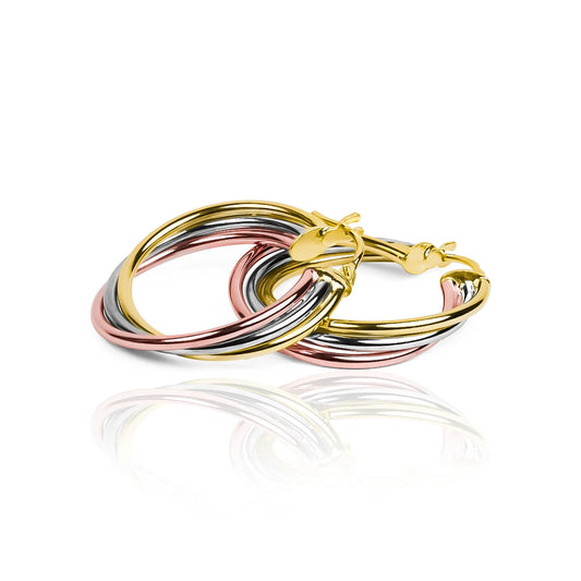 Candongas aros espiral, elaboradas en oro 18K por Joyería Caracas. Con su garantía para toda la vida.