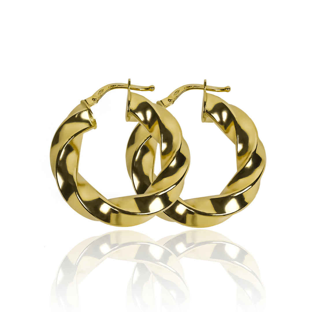 Candongas melcocha Spira M fabricadas en oro 18k por Joyería Caracas, cuenta con una garantía para toda la vida.