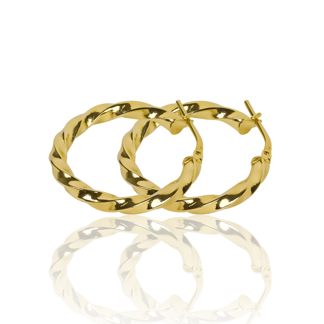 Candongas melcocha twiste M fabricadas en oro 18k por Joyería Caracas, cuenta con una garantía para toda la vida.