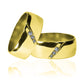 Argollas de matrimonio clásica canal, fabricadas en oro 18k de Joyería Caracas, cuentan con garantía de por vida.