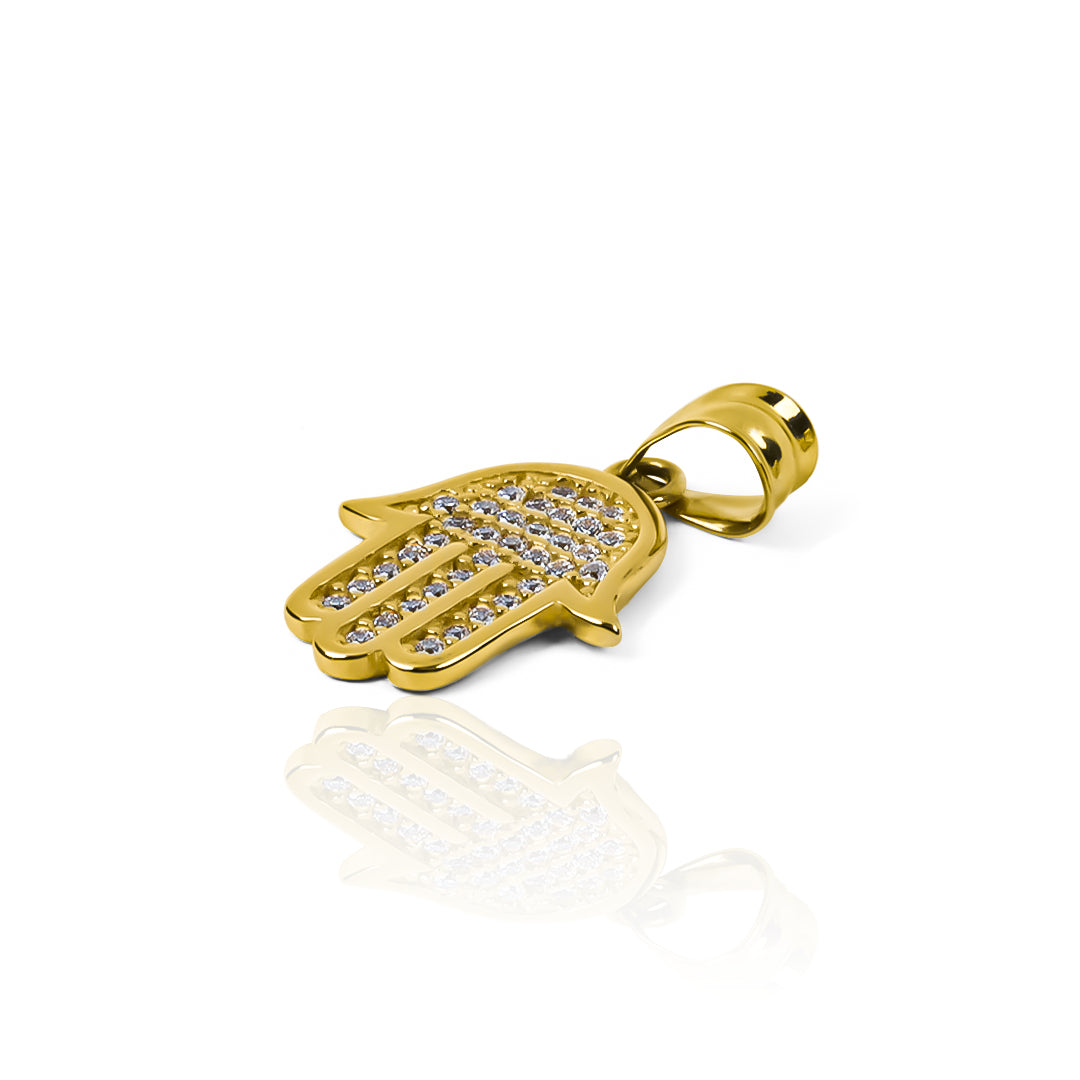 Dije Manito Divina, elaborado en oro 18K por Joyería Caracas, cuenta con certificado de calidad y garantía.