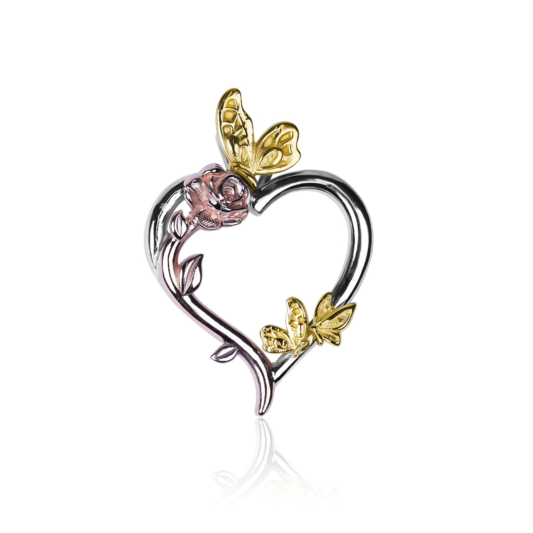 Dije Corazón mariposas 3 oros son una obra de arte de Joyería Caracas, hechos con Oro 18K de la más alta calidad, con garantía de por vida.