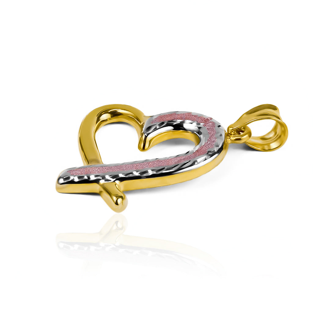 Dije con forma de corazón hecho de tres oros, Joyería Caracas te presenta el regalo perfecto, cuenta con garantía de por vida. 