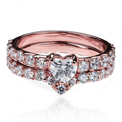 Anillo de compromiso duo con corazón enamorado en oro 18k en Joyería Caracas. Cuenta con un certificado de calidad y garantía de por vida.