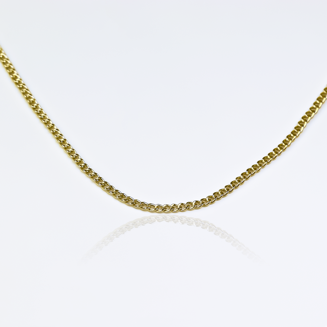 Cadena mini cubana 40 es una joya exclusiva de Joyería Caracas que hará brillar tu estilo. Hecha con oro de 18k, esta pieza de alta calidad viene con una garantía de por vida para asegurar tu satisfacción.