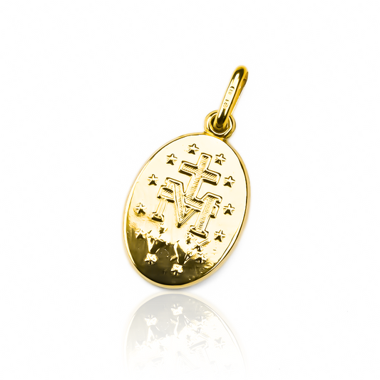 Dije Milagrosa H M I. Fabricado con oro 18K de la más alta calidad y diseño de Joyería Caracas, cuenta con garantía de por vida. 