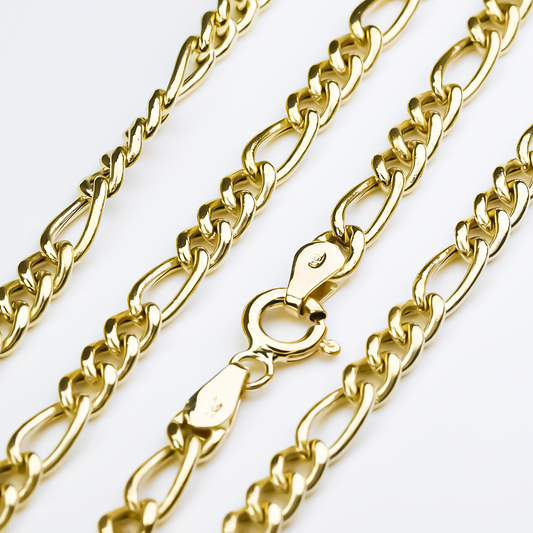 Cadena Cubana 3x1E60 es una cadena elaborada en oro de 18k por la Joyería Caracas. Cuenta con garantía de por vida. 