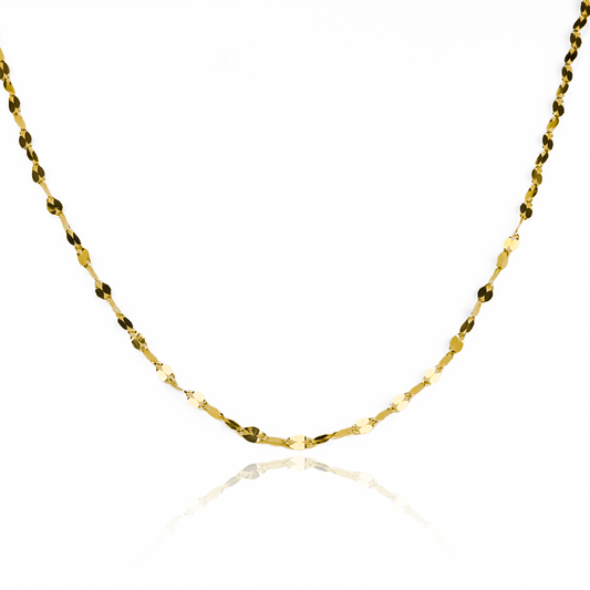 Cadena de oro 18K de 40cm de Joyería Caracas es perfecta para un look sofisticado. Su diseño único y su calidad de joyería garantizan un toque de lujo a cualquier atuendo.