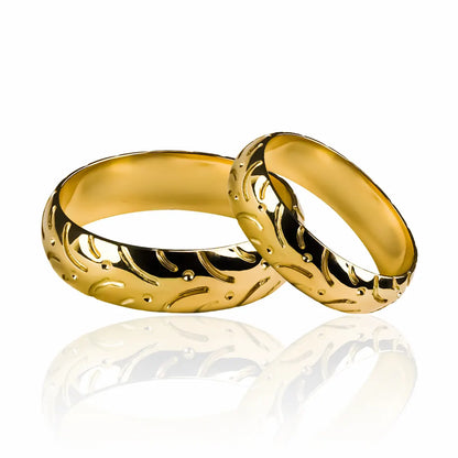 Argollas de matrimonio Moto Lover, fabricados en oro 18 quilates, cada argolla cuenta con certificado de calidad y garantía de por vida.
