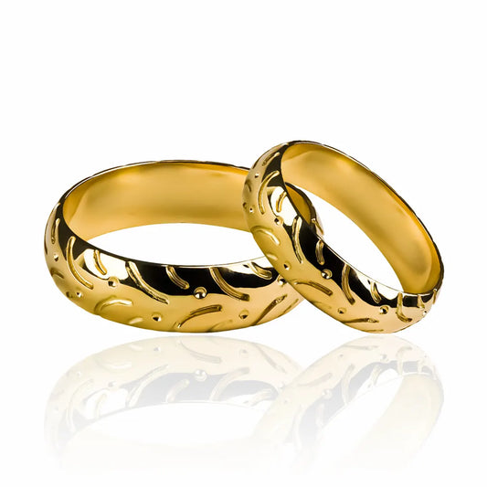 Argollas de matrimonio Moto Lover, fabricados en oro 18 quilates, cada argolla cuenta con certificado de calidad y garantía de por vida.