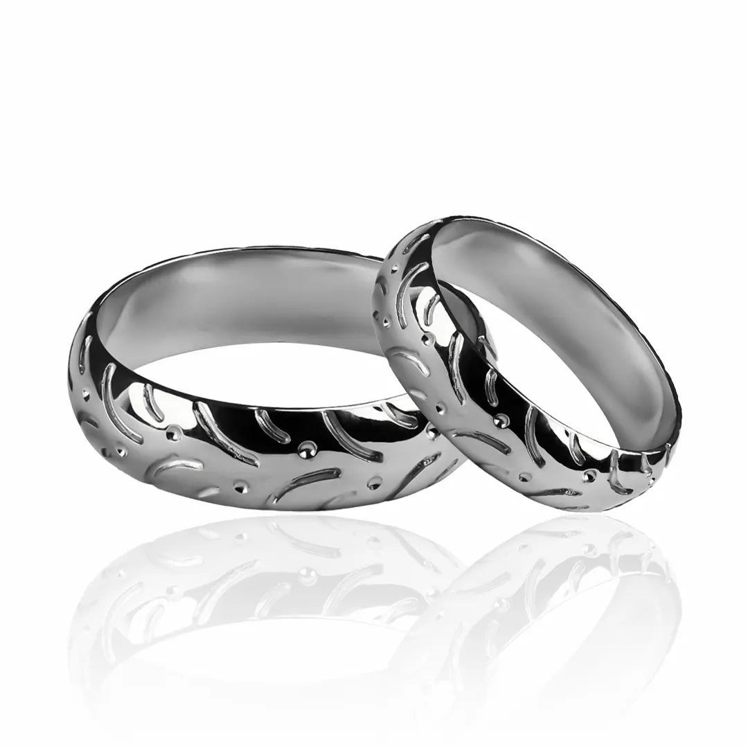 Argollas de matrimonio Moto Lover, fabricados en oro 18 quilates, cada argolla cuenta con certificado de calidad y garantía de por vida.