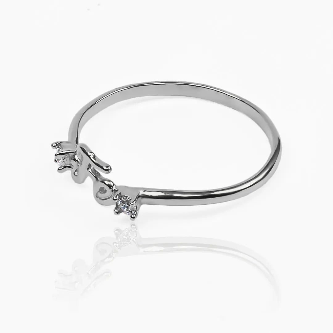 Anillo fe JT es una Joyería Caracas que simboliza elegancia y lujo. Hecho de oro 18k, es una pieza duradera y con garantía para toda la vida.