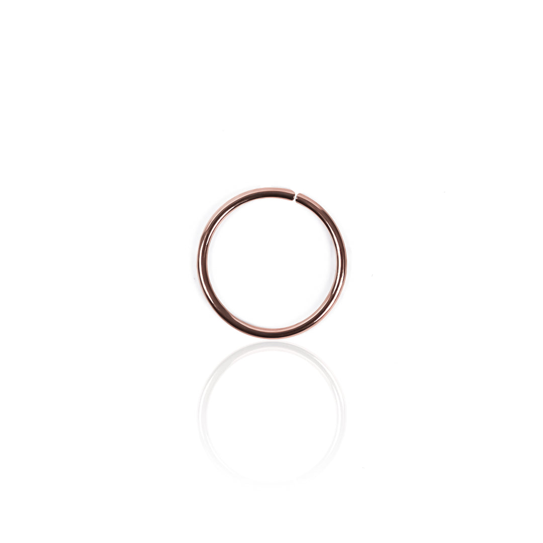 Piercing Aro, fabricado en oro 18K por Joyería Caracas, cuenta con certificado de calidad y garantía de por vida.