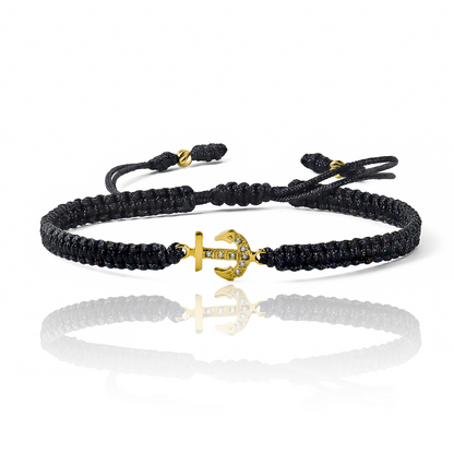 Pulsera Ancla + Esferas #3 de Joyería Caracas está elaborada en oro 18k, con detalles en hilo coreano y bisutería de calidad. Con garantía de por vida y sin costo adicional.