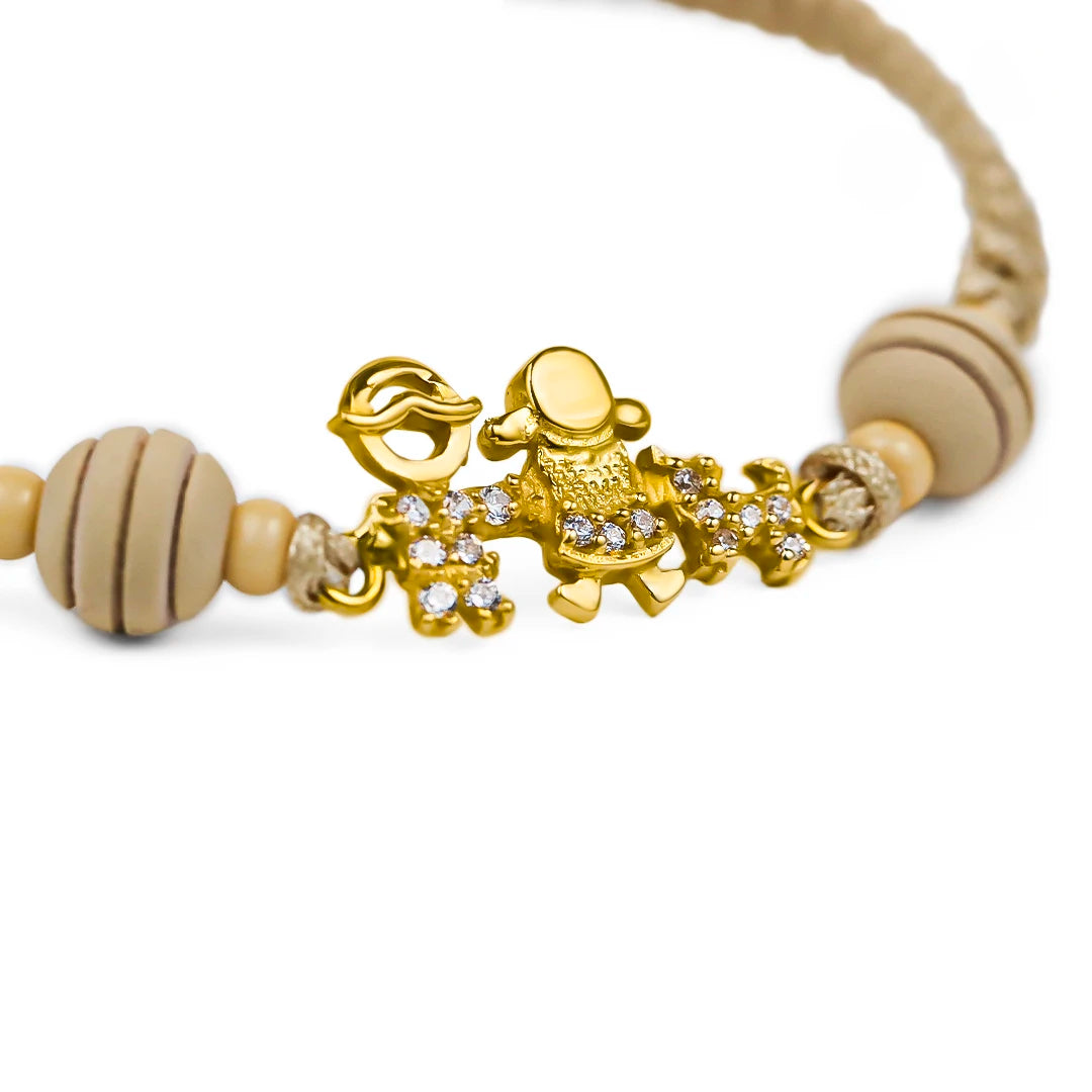 Pulsera Family dog. Hecha de Oro 18K y diseñada por Joyería Caracas, cuenta con garantía de por vida. 