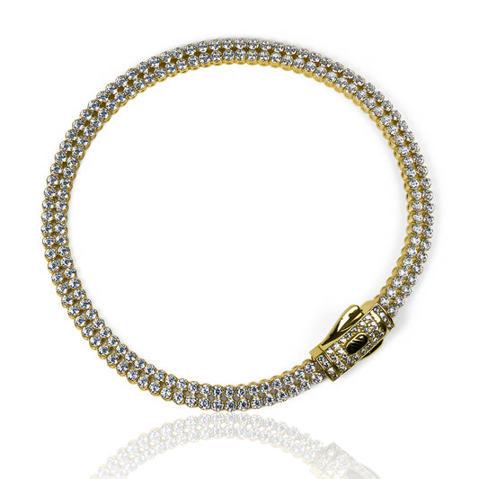 Pulsera Monaco cristales dobles fabricada en oro 18K por Joyería Caracas. Además, cuenta con garantía para toda la vida, asegurando su calidad y durabilidad.