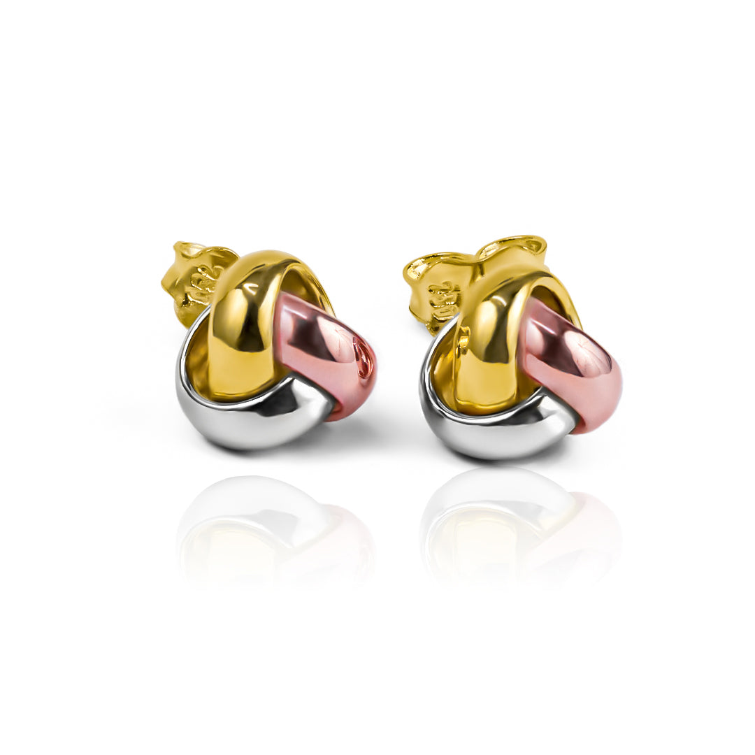 Topitos aros tres oros I de Joyería Caracas. Hechos de oro 18k, estos aros tienen una garantía de por vida, asegurando su calidad y valor exclusivo.